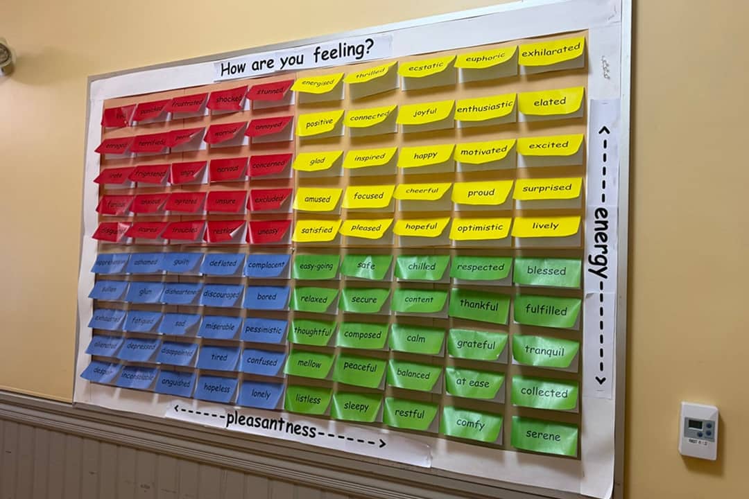 A sign assessing students’ well-being posted in the hallway of Lewiston Public Schools’ administrative headquarters on July 1, 2026.